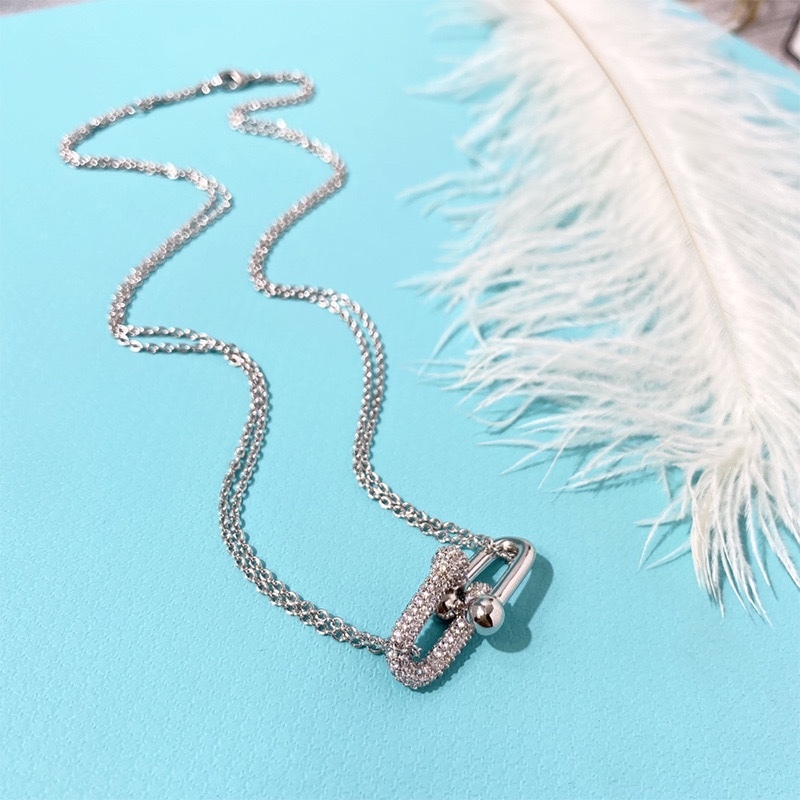 Buy replica Tiffany Diamond Double Horseshoe Clasp Pendant Necklace and replica jewelry from PICKS Jewelry
