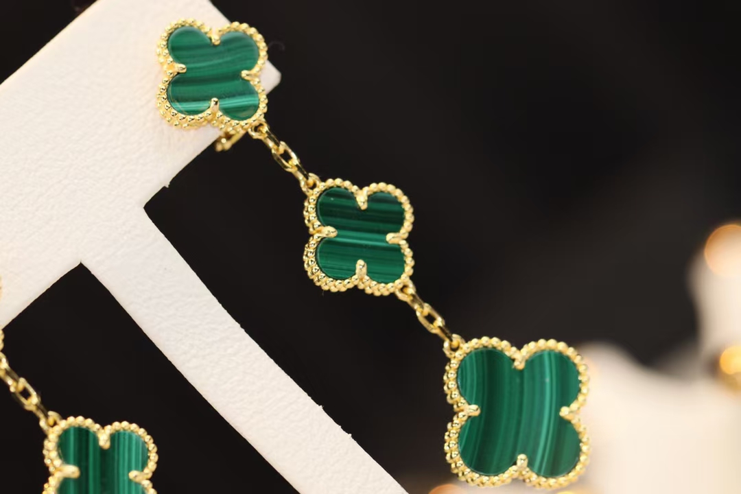 Buy replica Van Cleef & Arpels Magic Alhambra Earrings 3 Motifs and replica jewelry from PICKS Jewelry