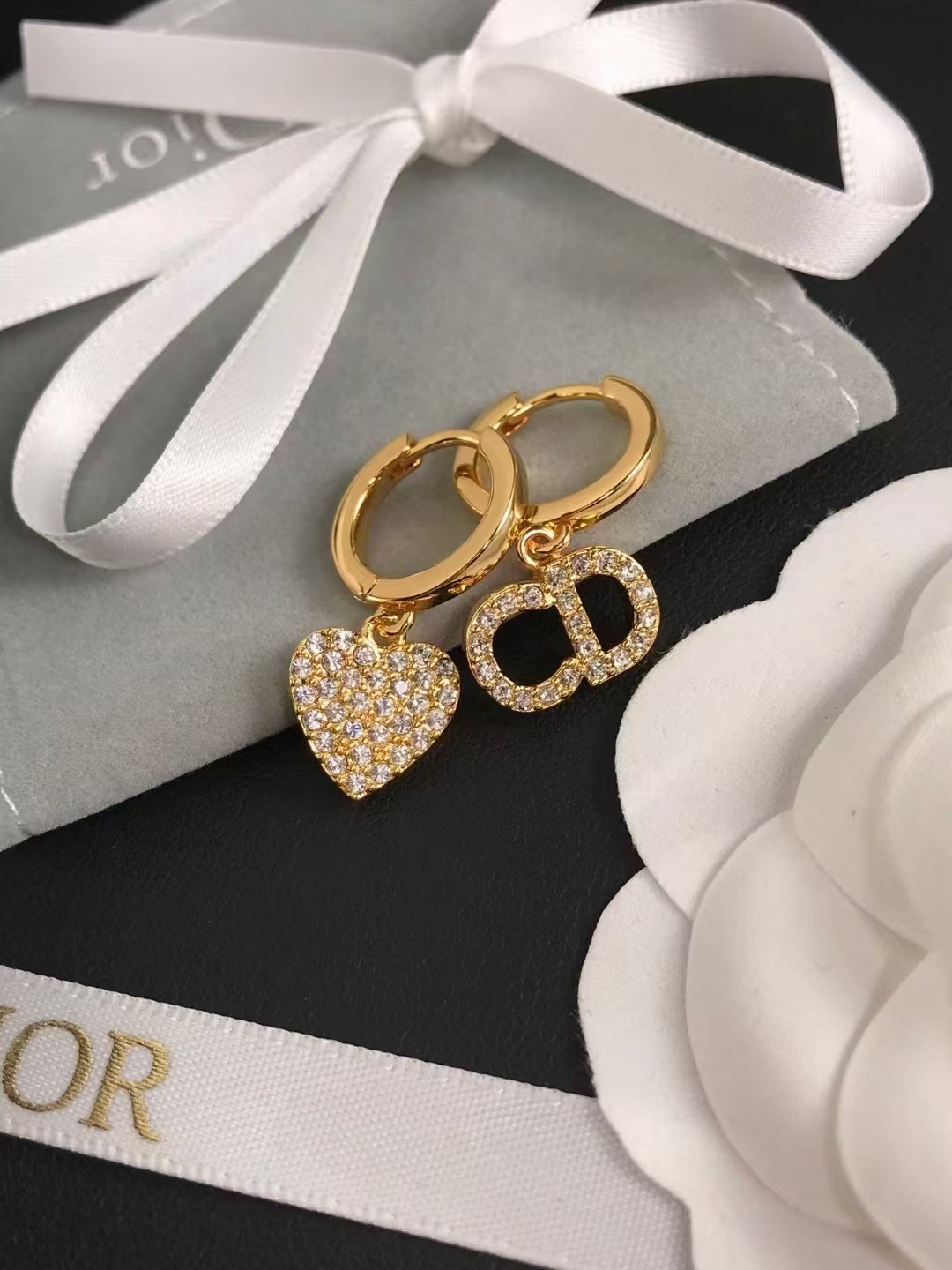 Buy replica Dior Asymmetric Heart CD Dangle Earrings and replica jewelry from PICKS Jewelry
