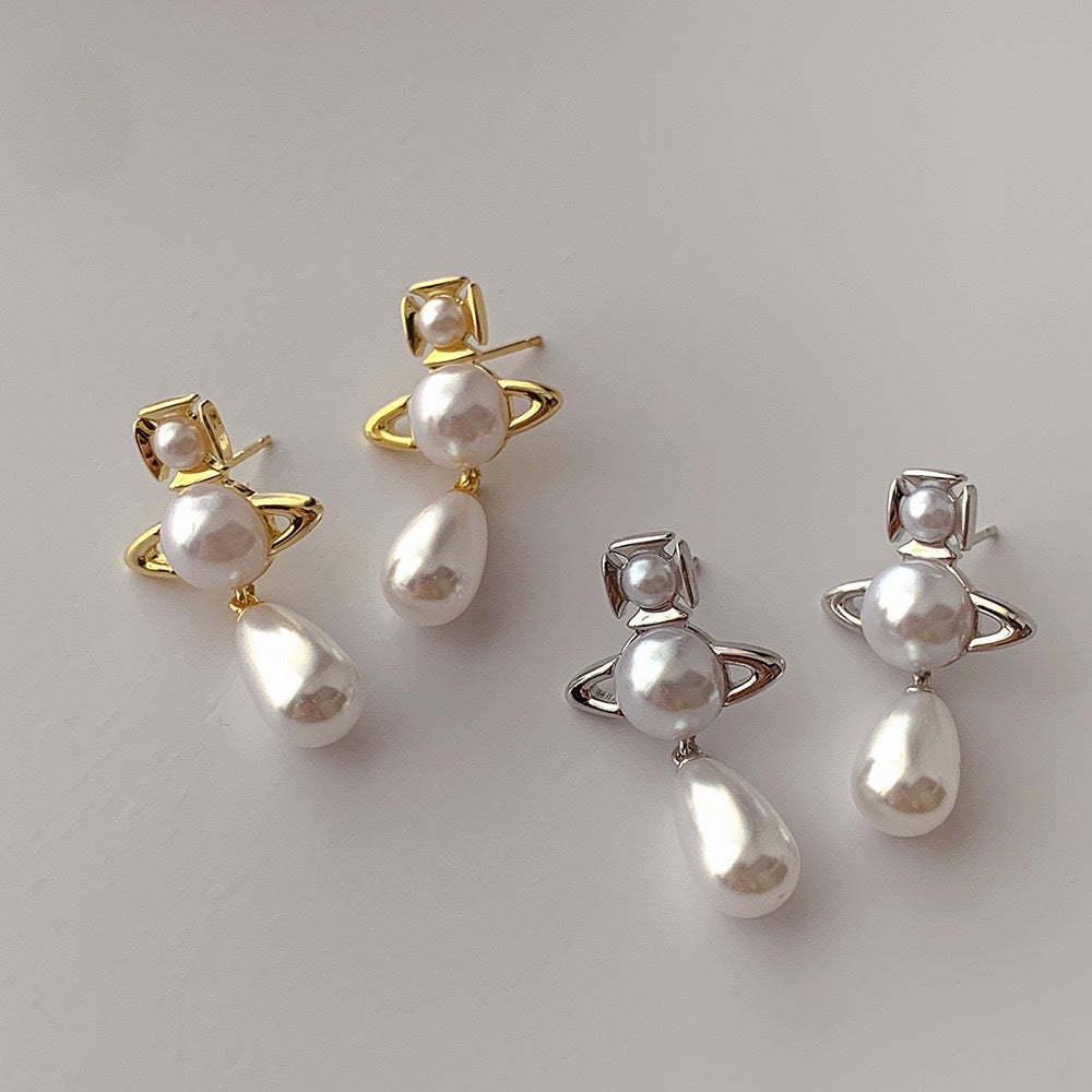 Buy replica Vivienne Westwood Teardrop Pearl Saturn Earrings and replica jewelry from PICKS Jewelry