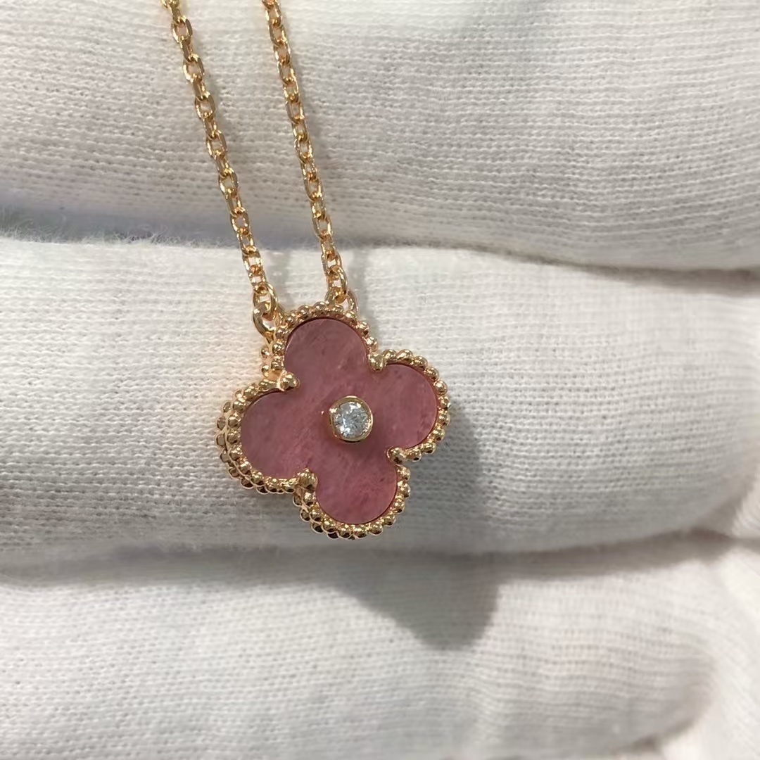 Buy replica Van Cleef & Arpels Rhodonite Vintage Alhambra Diamond 2021 Holiday Pendant Necklace and replica jewelry from PICKS Jewelry