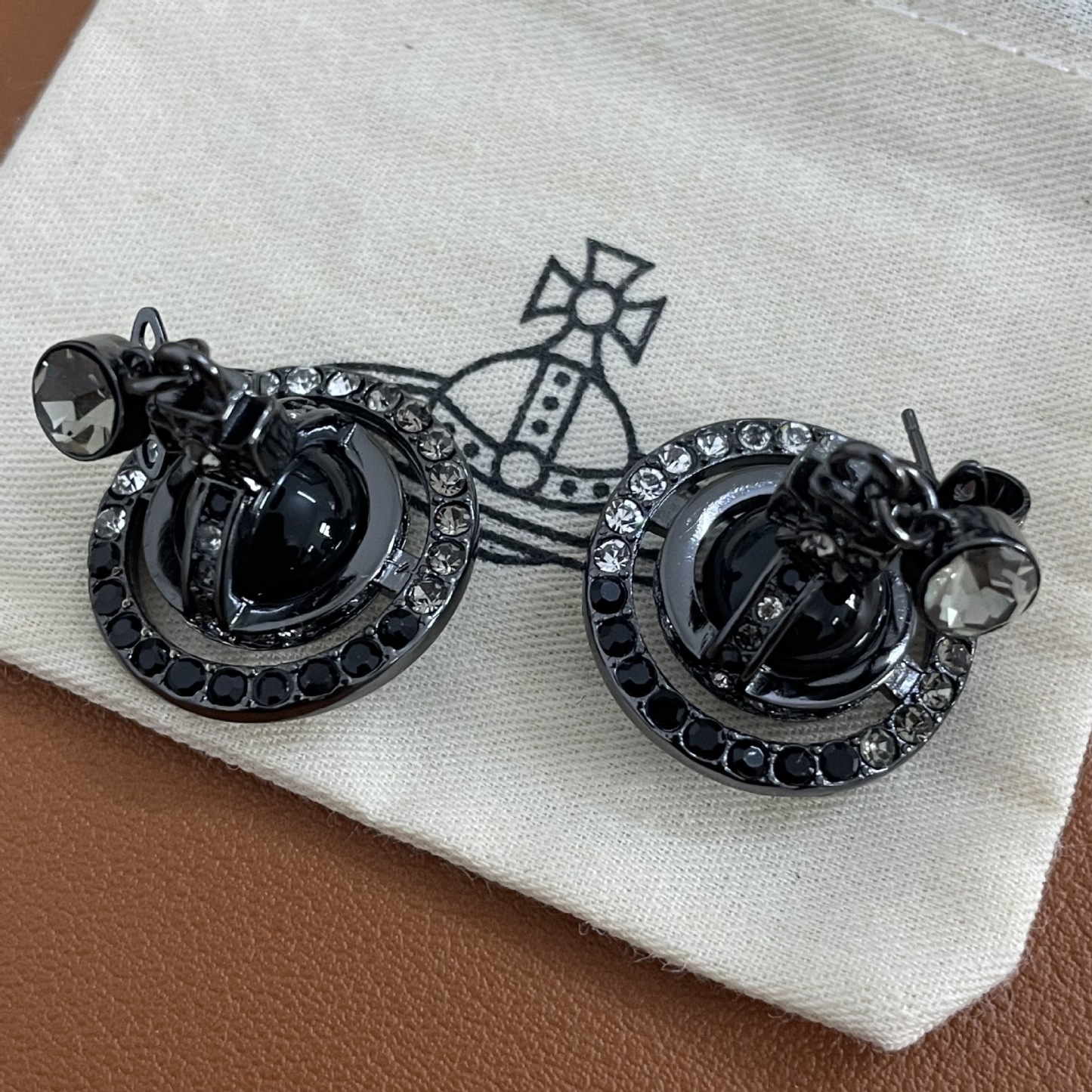 Buy replica Vivienne Westwood Punk Style Cool Girl Black Saturn Earrings and replica jewelry from PICKS Jewelry