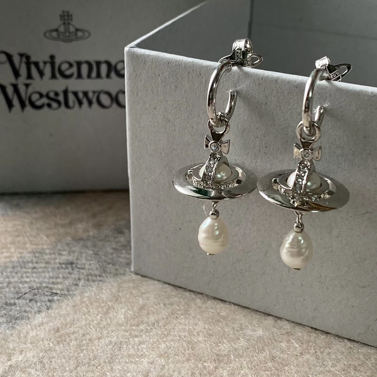 Buy replica Vivienne Westwood Baroque Pearl Drop Saturn Earring and replica jewelry from PICKS Jewelry