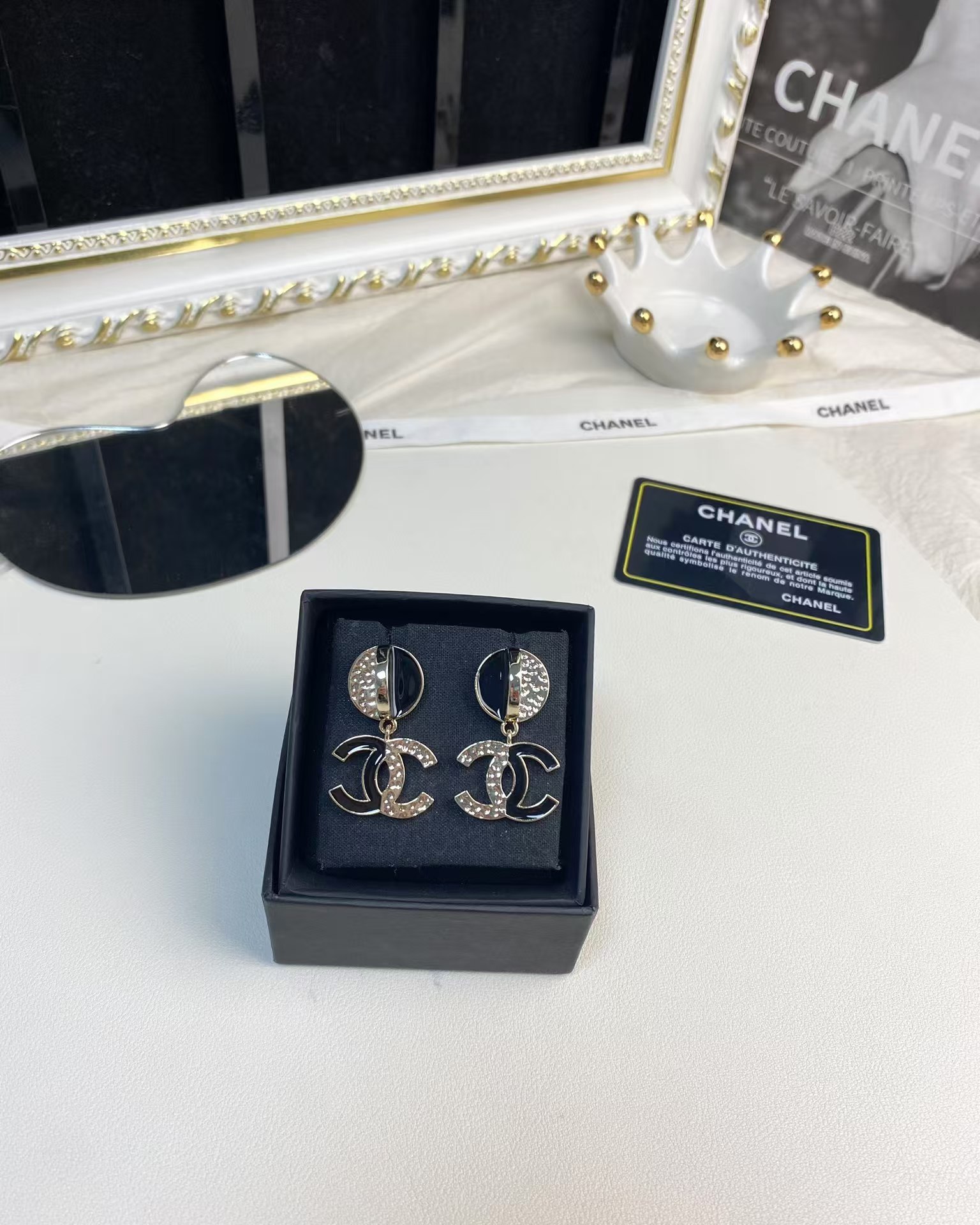 Buy replica Chanel Half Black Enamel Double C Dangle Earrings and replica jewelry from PICKS Jewelry
