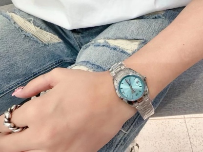 Buy replica Vivienne Westwood Light Blue Dial Silver Band Saturn Watch - 28MM and replica jewelry from PICKS Jewelry
