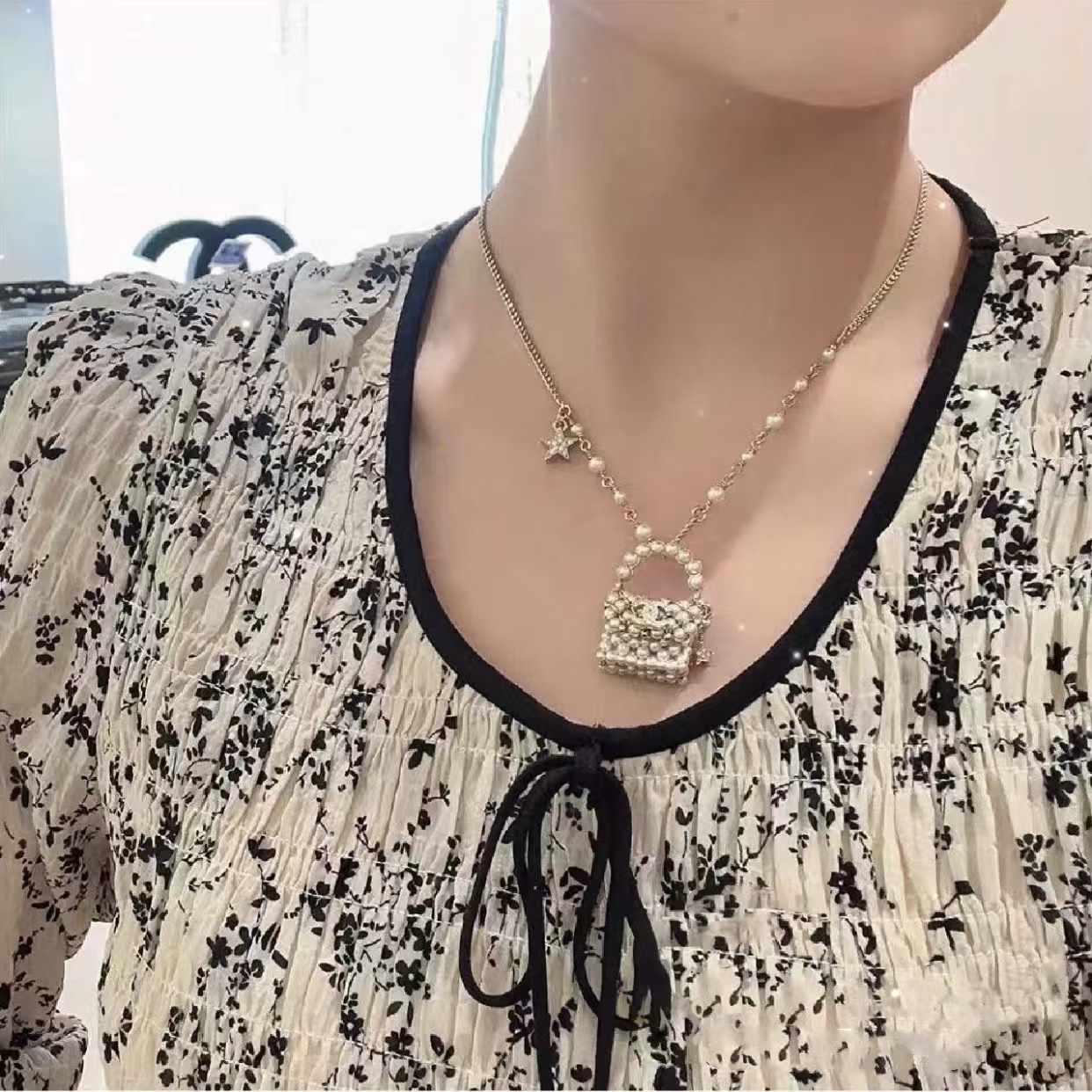 Buy replica Chanel Pearl Bag Pendant Necklace and replica jewelry from PICKS Jewelry