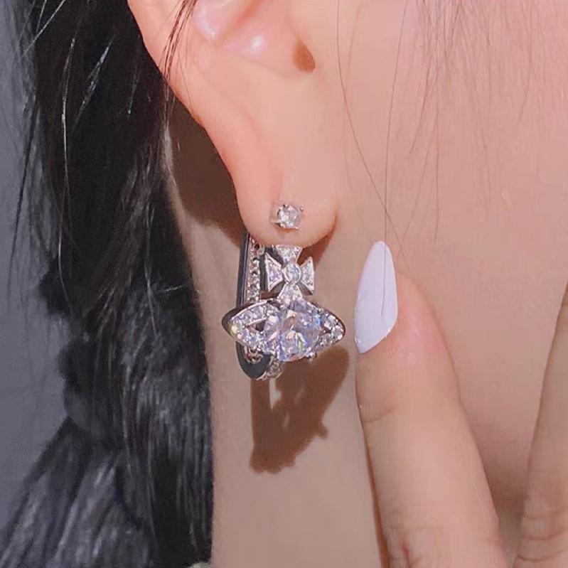 Buy replica Vivienne Westwood Pink White Diamond Saturn Earrings and replica jewelry from PICKS Jewelry