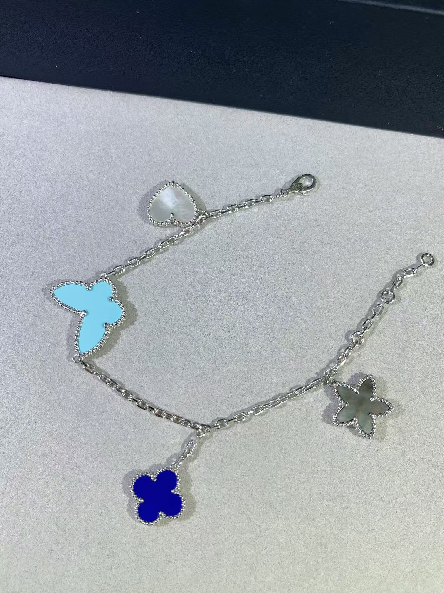 Buy replica Van Cleef & Arpels Limited Version Lucky Alhambra 4 Motifs Bracelet and replica jewelry from PICKS Jewelry