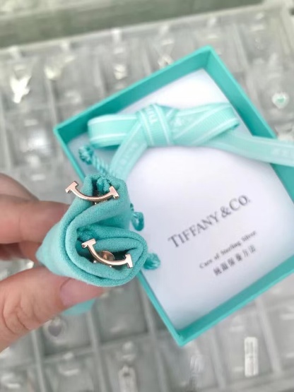 Buy replica Tiffany T Smile Earrings and replica jewelry from PICKS Jewelry
