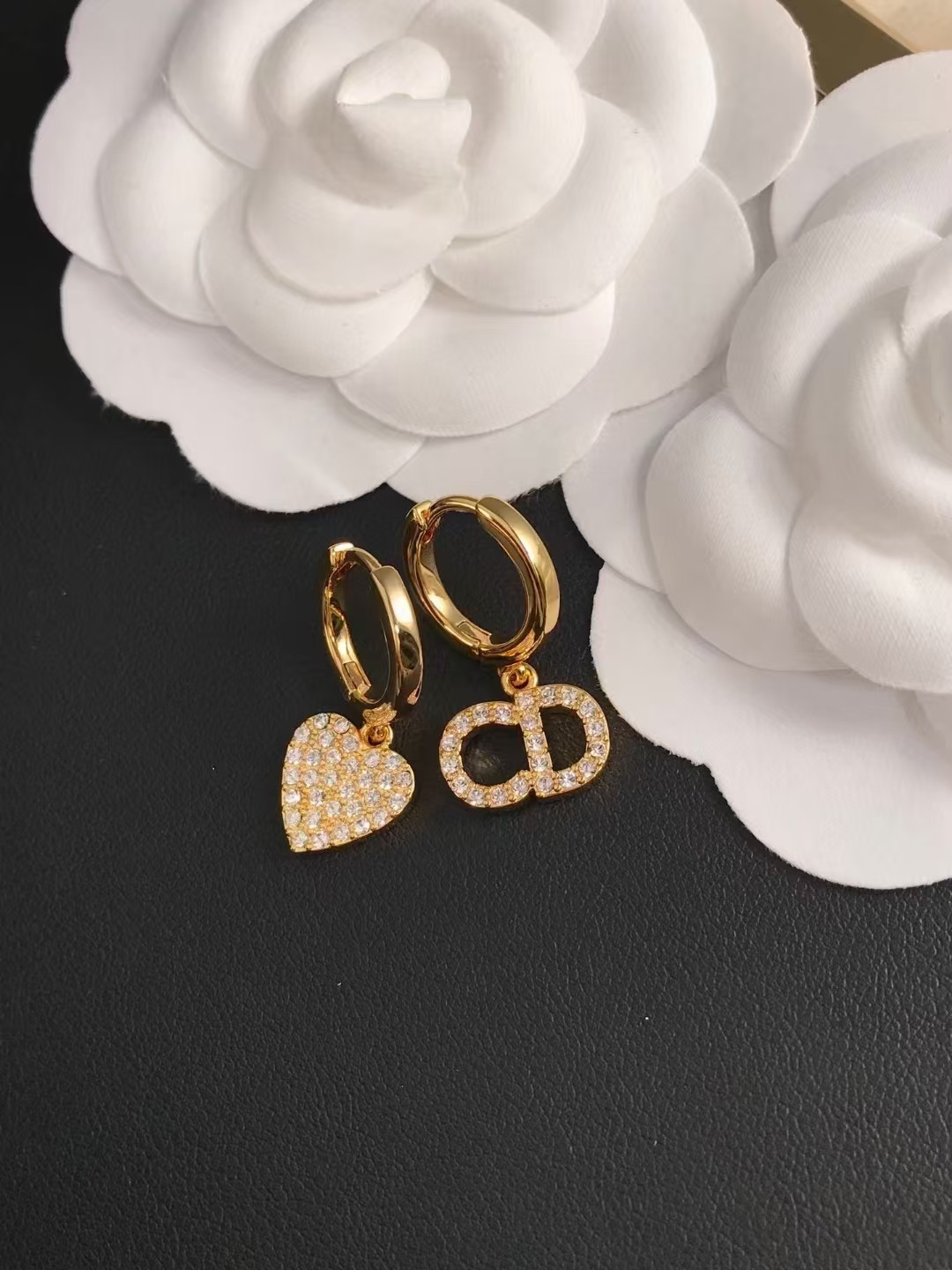 Buy replica Dior Asymmetric Heart CD Dangle Earrings and replica jewelry from PICKS Jewelry