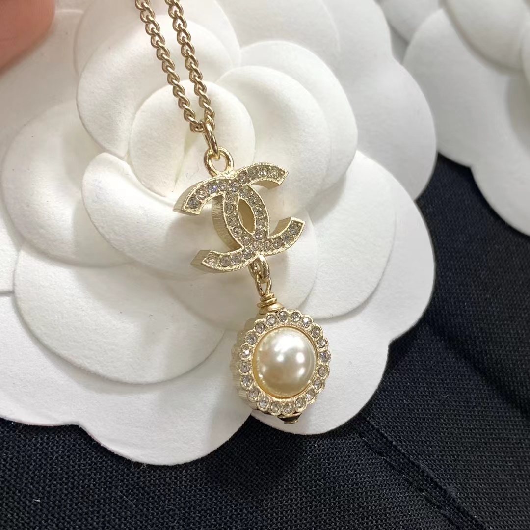 Buy replica Chanel Minimalist Double C Pearl Drop Necklace and replica jewelry from PICKS Jewelry