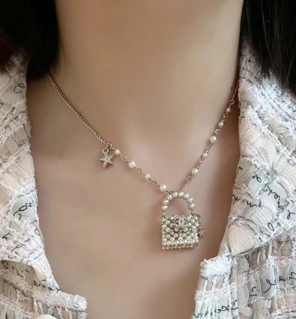 Buy replica Chanel Pearl Bag Pendant Necklace and replica jewelry from PICKS Jewelry