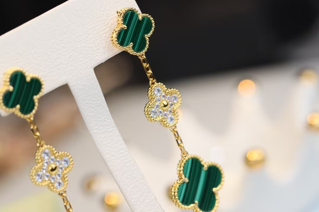 Buy replica Van Cleef & Arpels Magic Alhambra Earrings 3 Motifs and replica jewelry from PICKS Jewelry