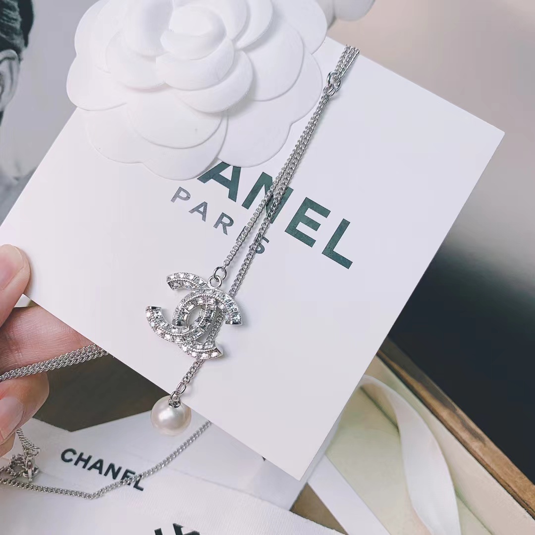 Buy replica Chanel Silver Color Tassel Pendant Necklace and replica jewelry from PICKS Jewelry