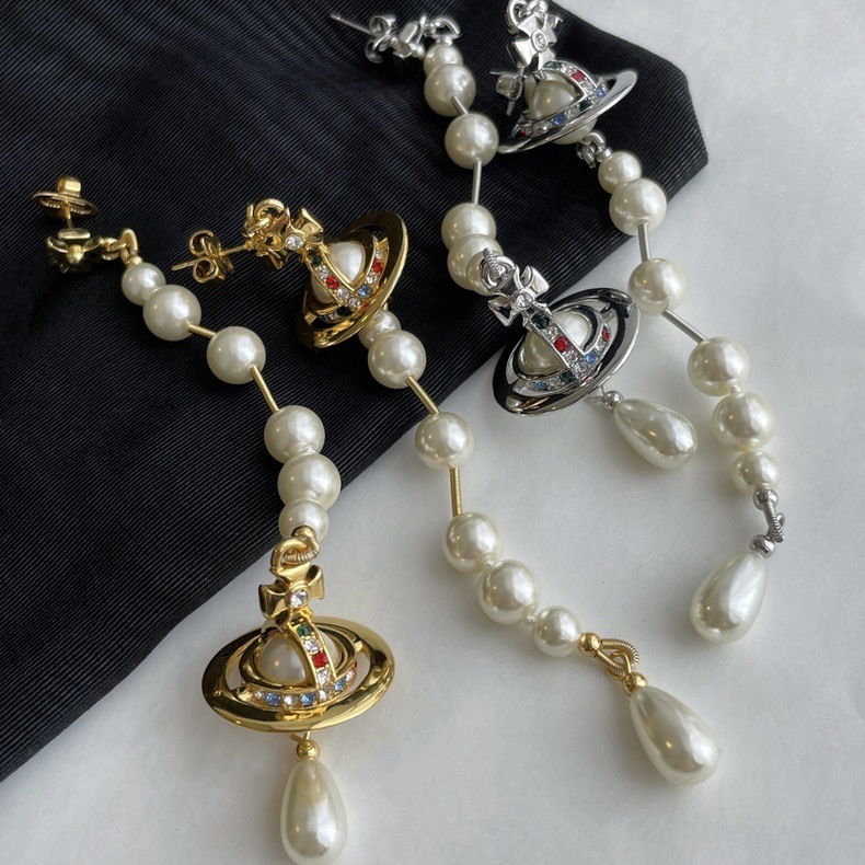 Buy replica Vivienne Westwood Asymmetric Tassel Pearl Saturn Earrings and replica jewelry from PICKS Jewelry