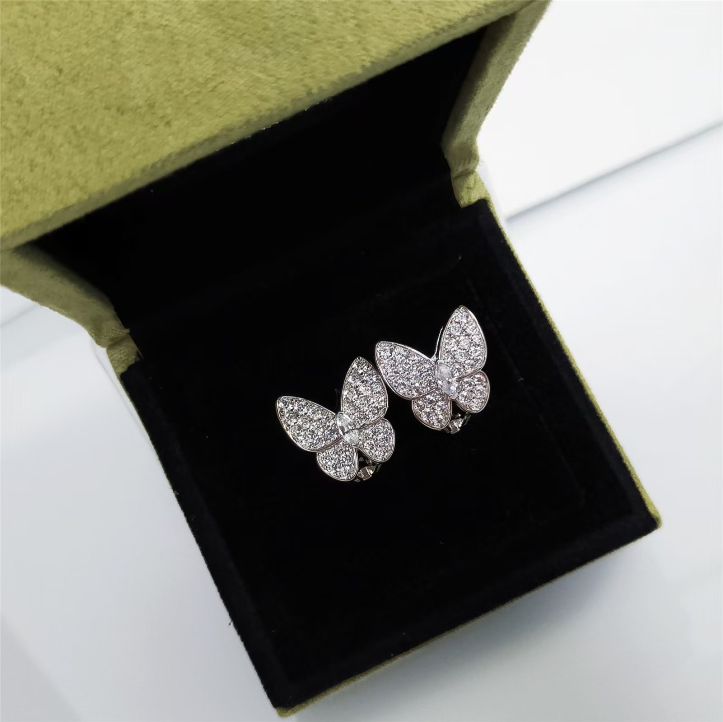 Buy replica Van Cleef & Arpels Two Butterfly Earrings and replica jewelry from PICKS Jewelry