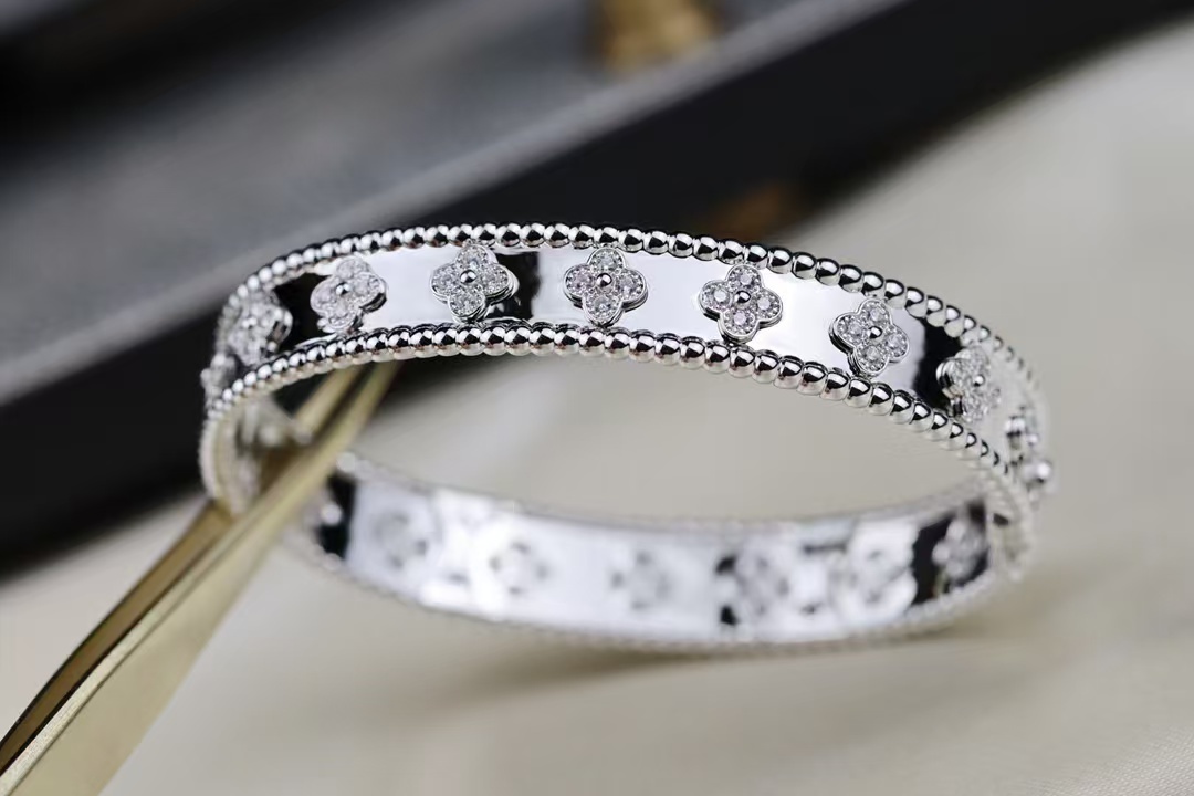 Buy replica Van Cleef & Arpels Perlée Clovers Bracelet, Medium Bangle and replica jewelry from PICKS Jewelry