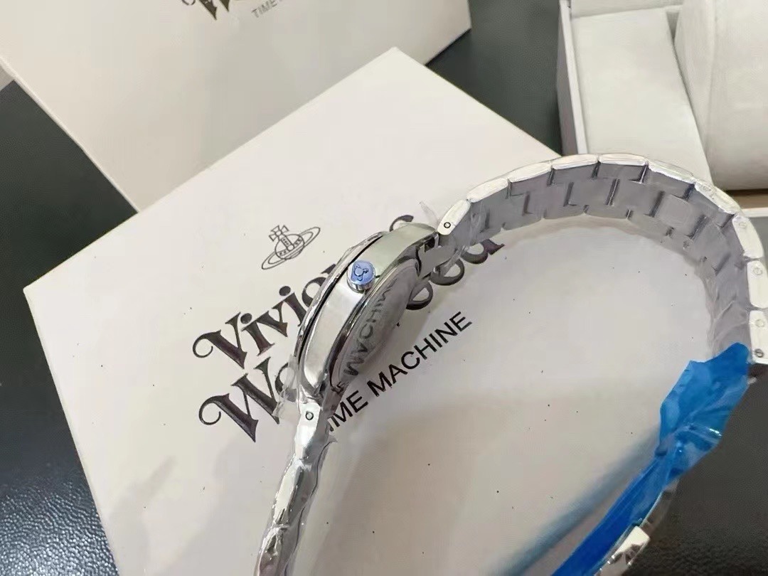 Buy replica Vivienne Westwood Light Blue Dial Silver Band Saturn Watch - 28MM and replica jewelry from PICKS Jewelry