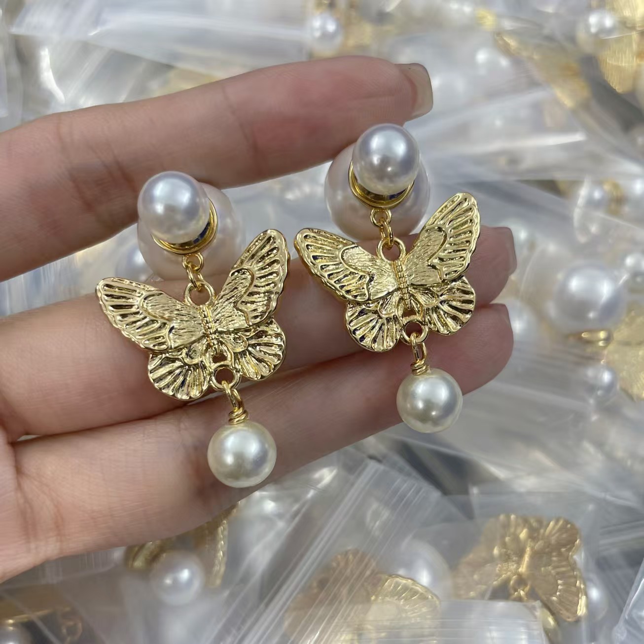 Buy replica Dior Butterfly with Pearl Earrings and replica jewelry from PICKS Jewelry