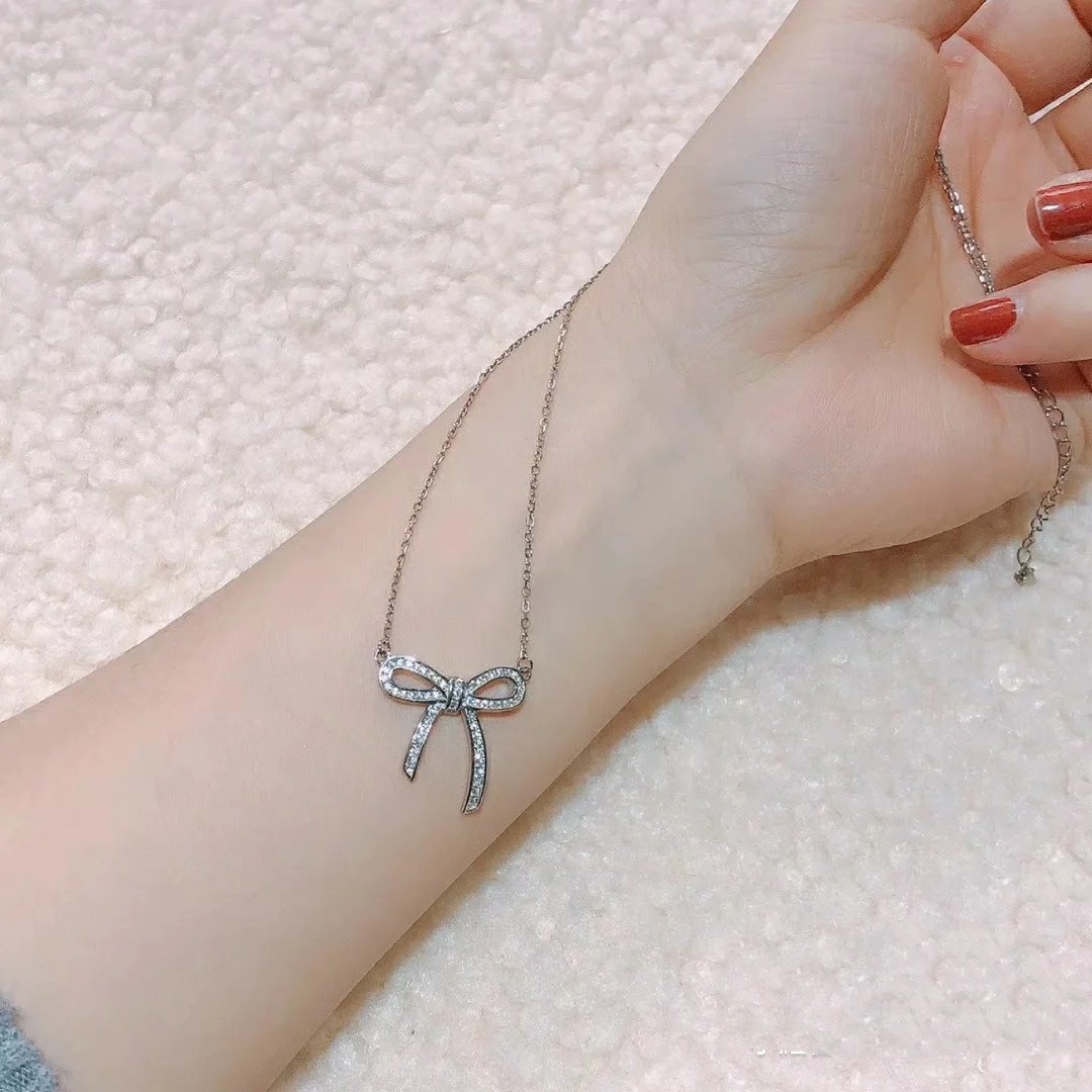 Buy replica Tiffany Large Full Diamond Bow Pendant Necklace and replica jewelry from PICKS Jewelry