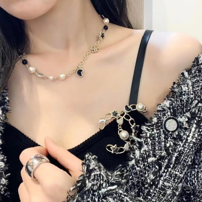 Buy replica Chanel Moon Star Pearl Charms Necklace and replica jewelry from PICKS Jewelry