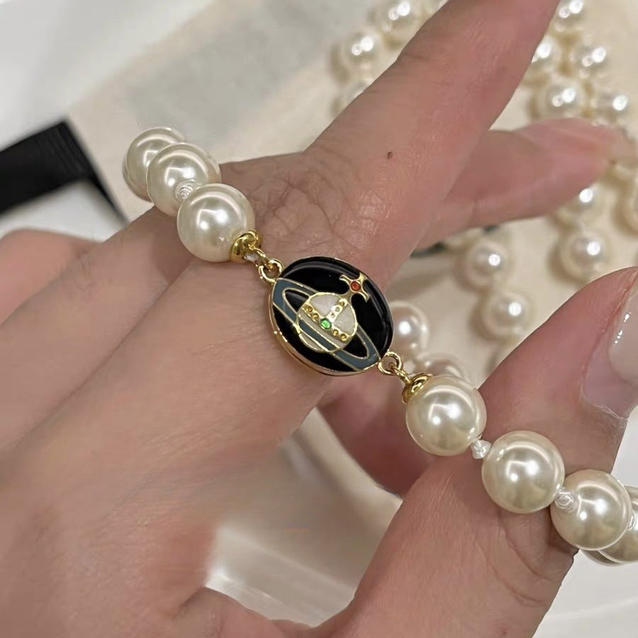 Buy replica Vivienne Westwood Enamel Epoxy Saturn Bracelet and replica jewelry from PICKS Jewelry