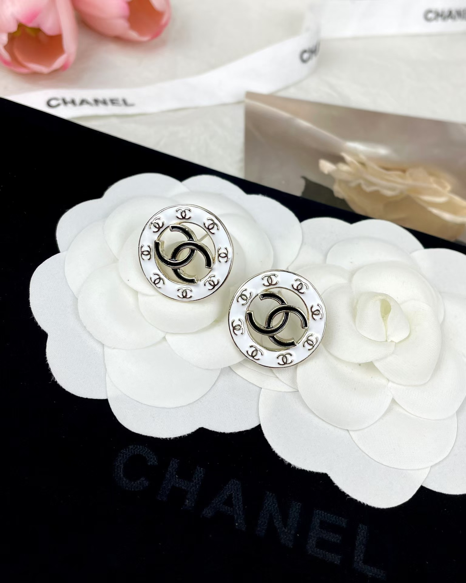 Buy replica Chanel Round White and Black Enamel Stud Earrings and replica jewelry from PICKS Jewelry