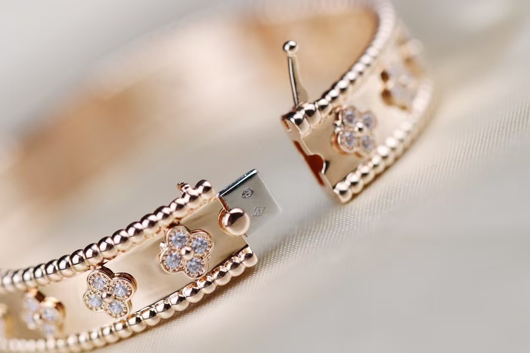 Buy replica Van Cleef & Arpels Perlée Clovers Bracelet, Medium Bangle and replica jewelry from PICKS Jewelry