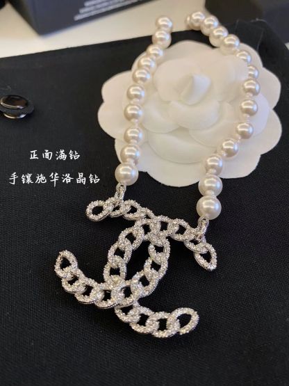 Buy replica Chanel Hollow Big Double C Pendant Pearl Necklace and replica jewelry from PICKS Jewelry