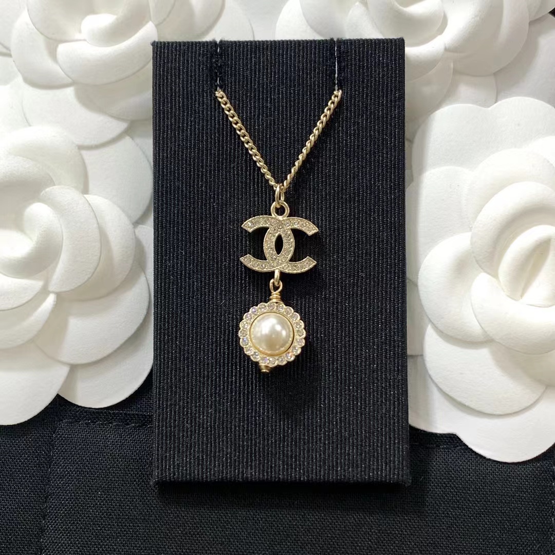 Buy replica Chanel Minimalist Double C Pearl Drop Necklace and replica jewelry from PICKS Jewelry