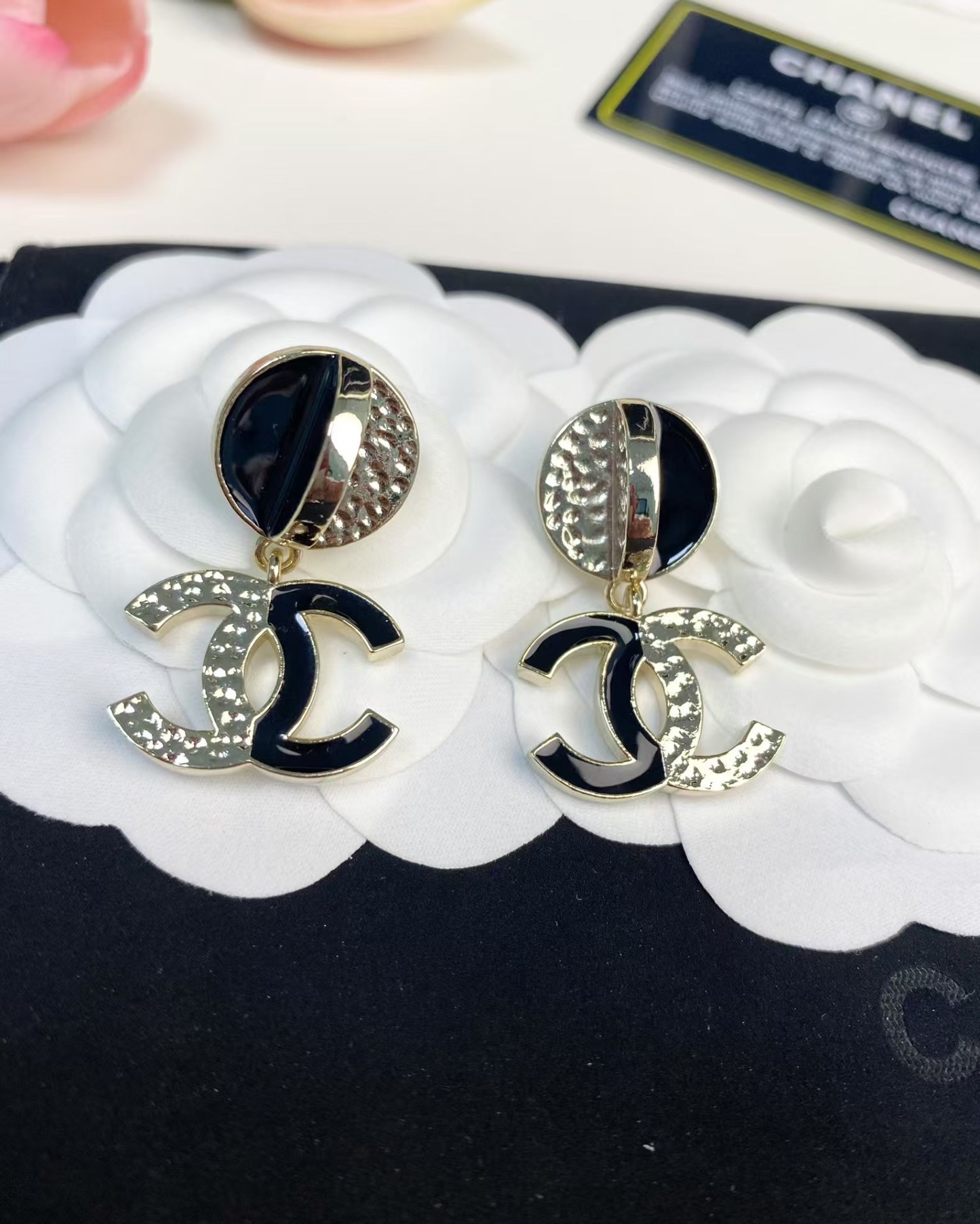 Buy replica Chanel Half Black Enamel Double C Dangle Earrings and replica jewelry from PICKS Jewelry