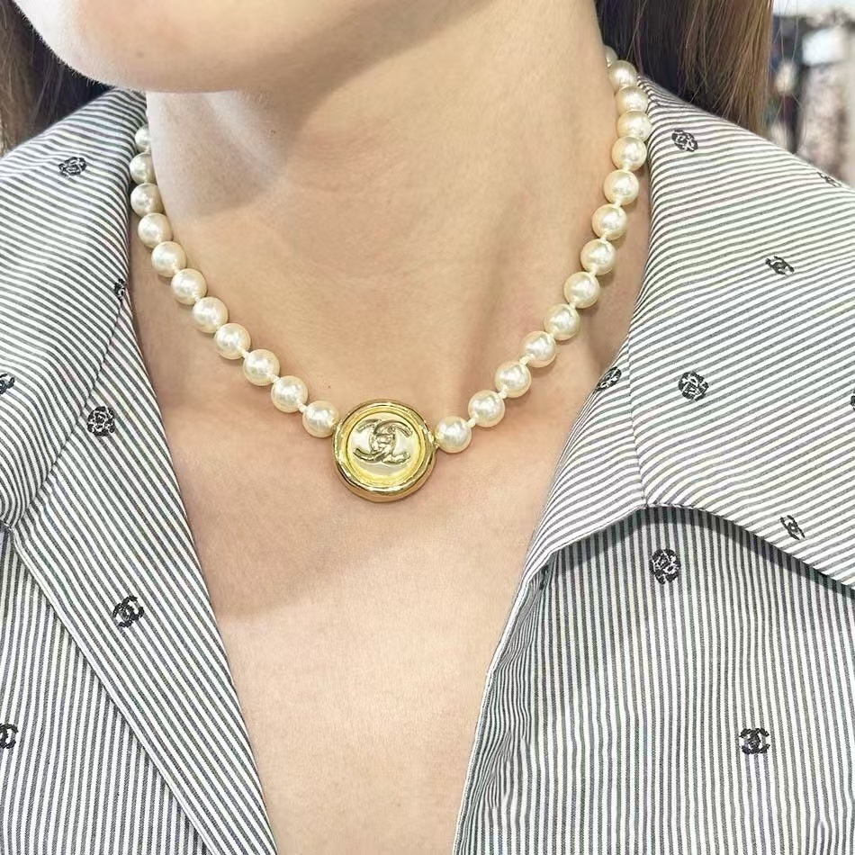 Buy replica Chanel Enhancer Double C Pendant Pearl Choker Necklace and replica jewelry from PICKS Jewelry