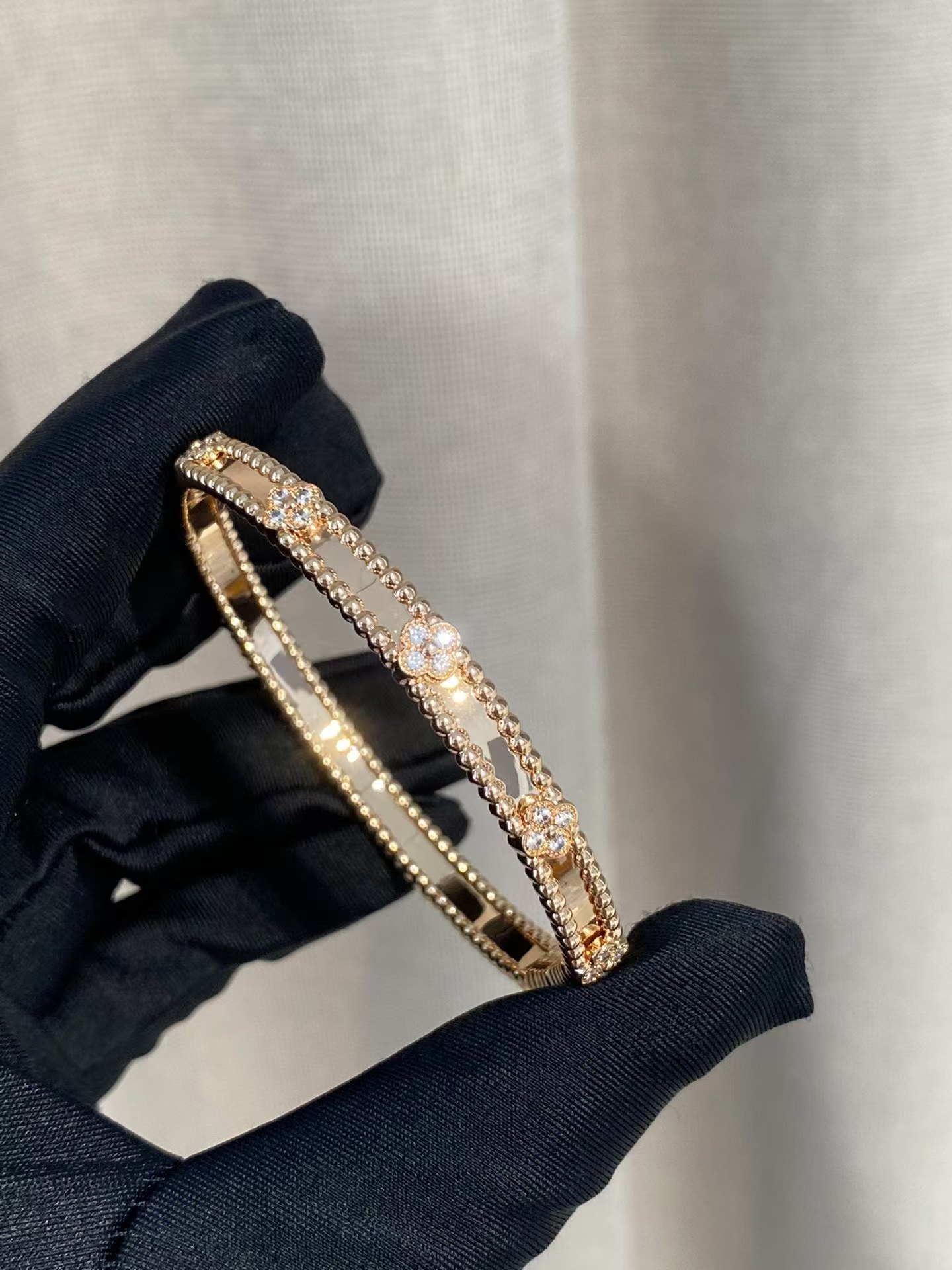 Buy replica Van Cleef & Arpels Perlée Sweet Clovers Bracelet, Medium Model and replica jewelry from PICKS Jewelry