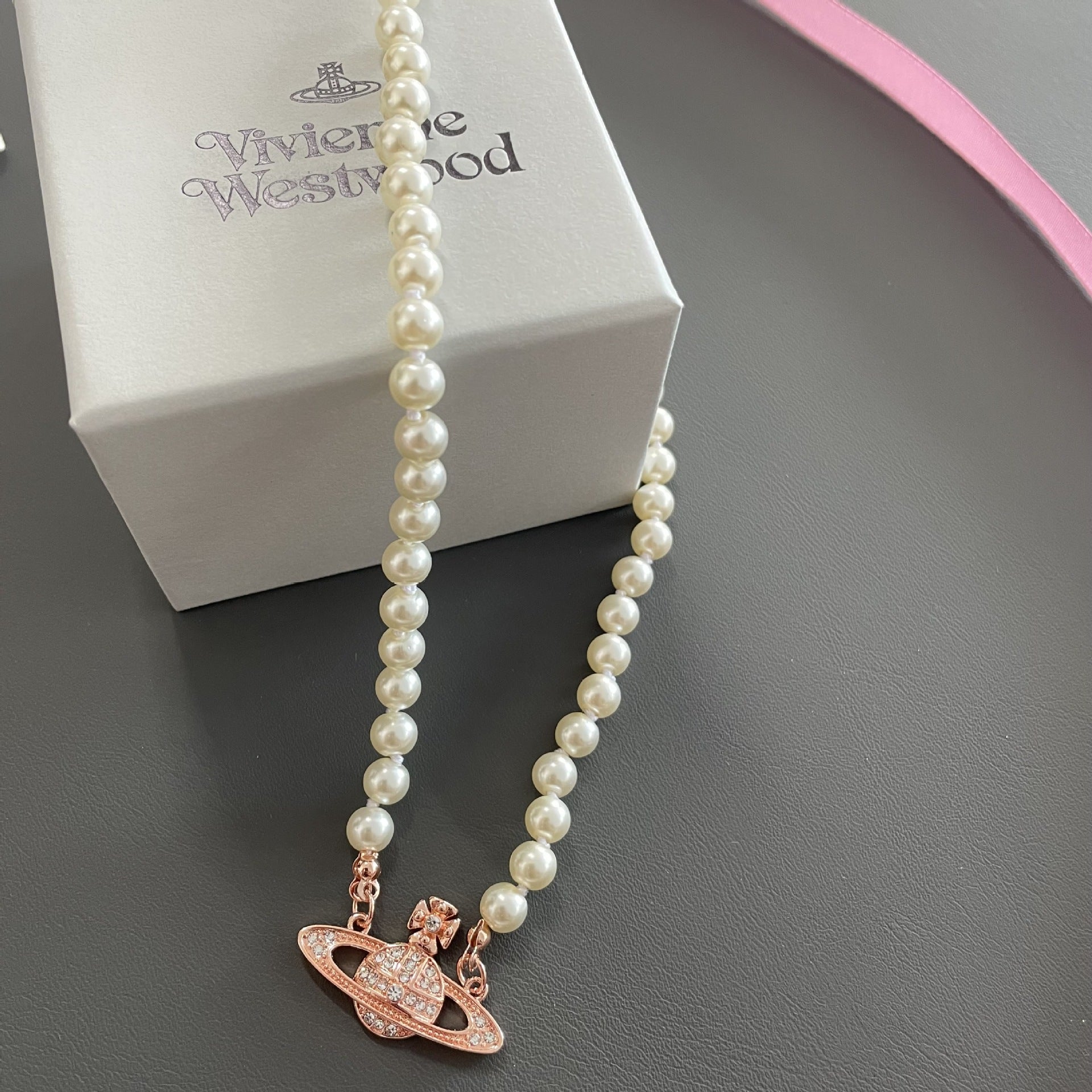 Buy replica Vivienne Westwood Saturn Pendant Pearl Necklace and replica jewelry from PICKS Jewelry