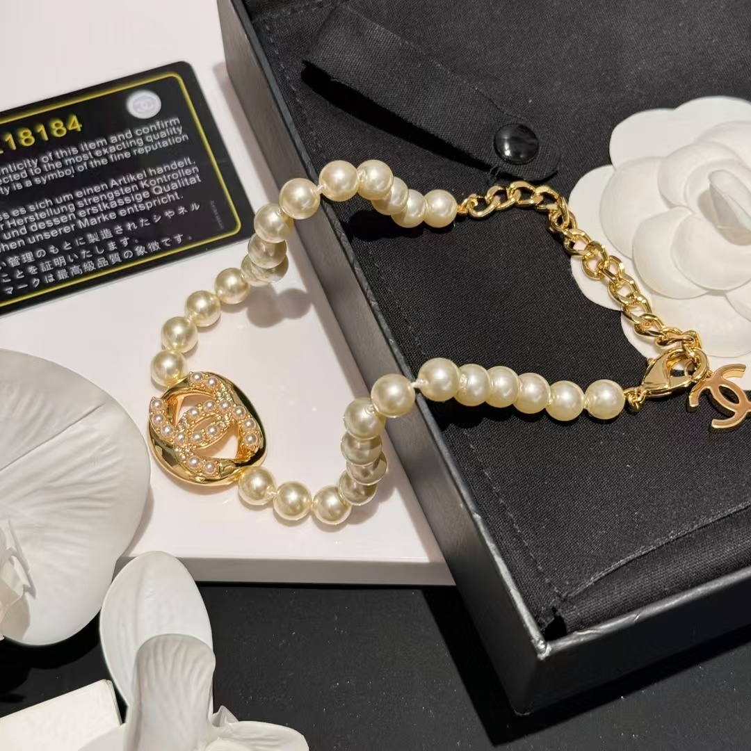 Buy replica Chanel Round Double C Pendant Pearl Choker Necklace and replica jewelry from PICKS Jewelry