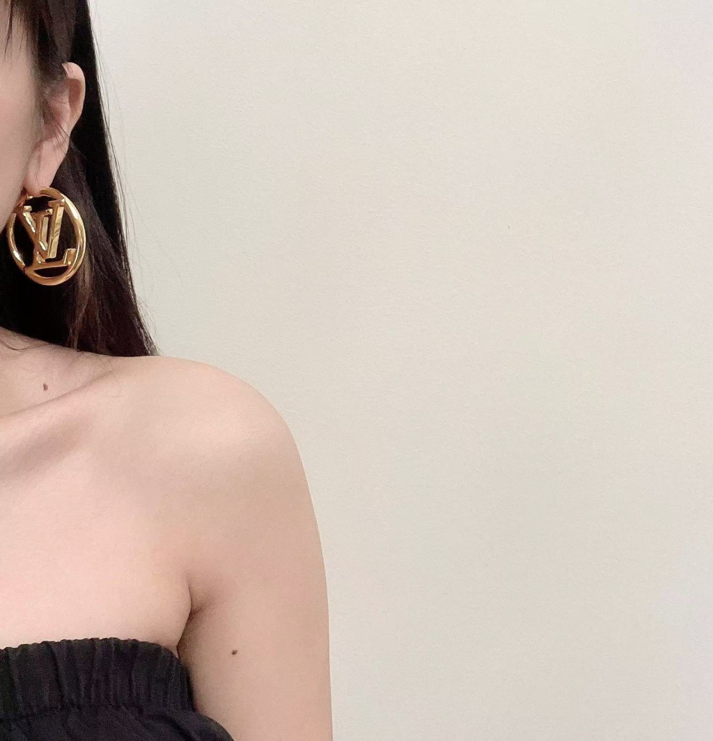 Buy replica Louis Vuitton Large Hollow Round LV Letter Earrings and replica jewelry from PICKS Jewelry