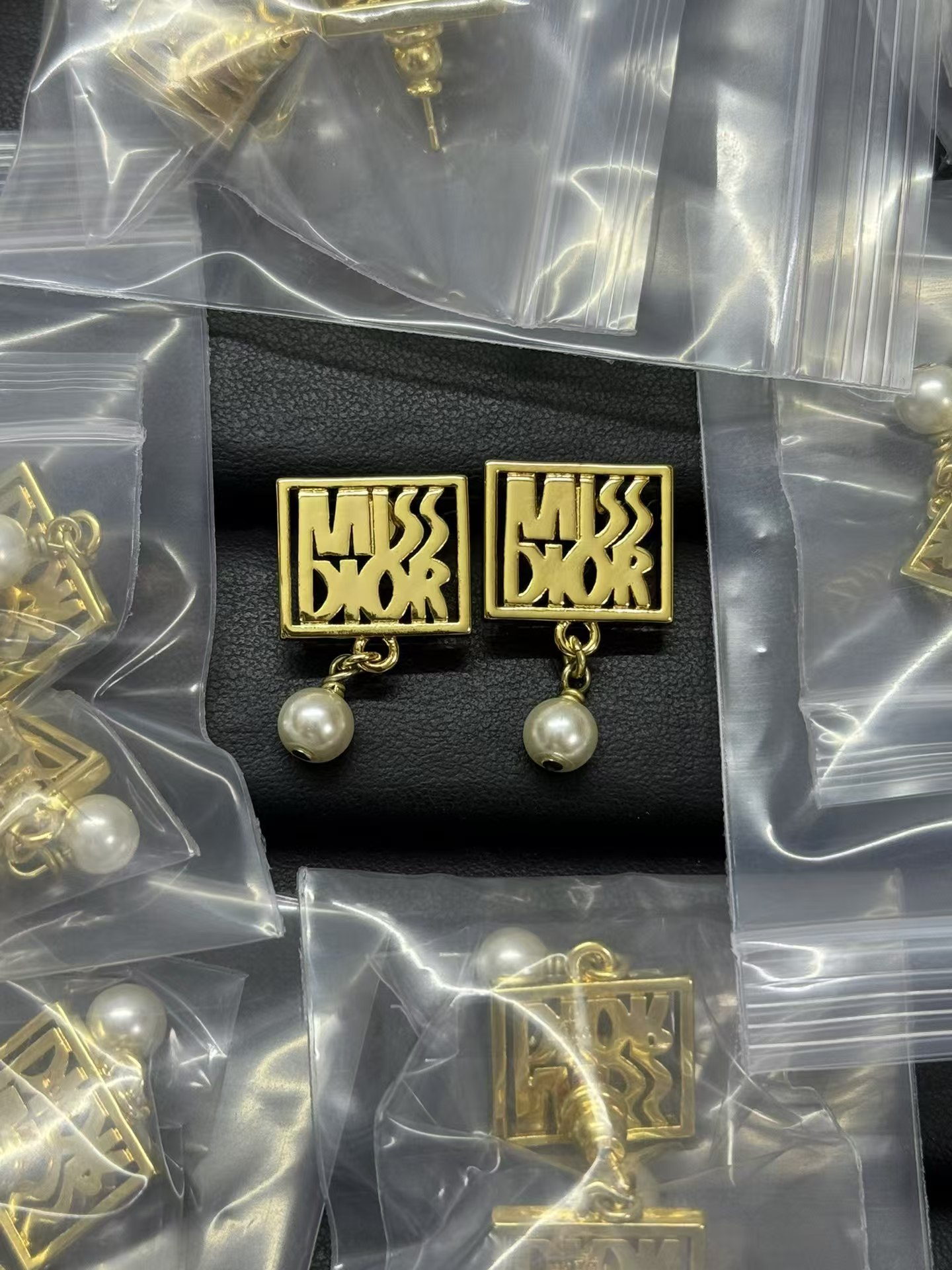 Buy replica Miss Dior Pearl Drop Earrings and replica jewelry from PICKS Jewelry