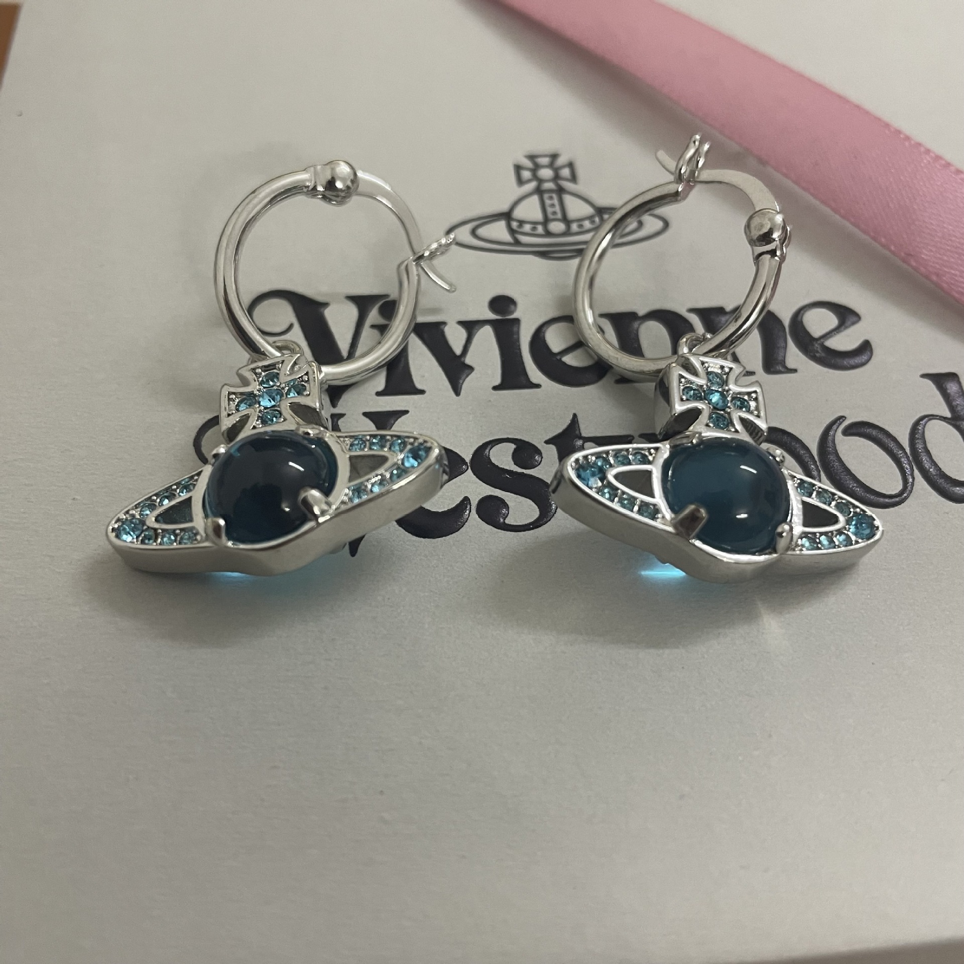 Buy replica Vivienne Westwood Blue Green Lucky Bead Saturn Earrings and replica jewelry from PICKS Jewelry