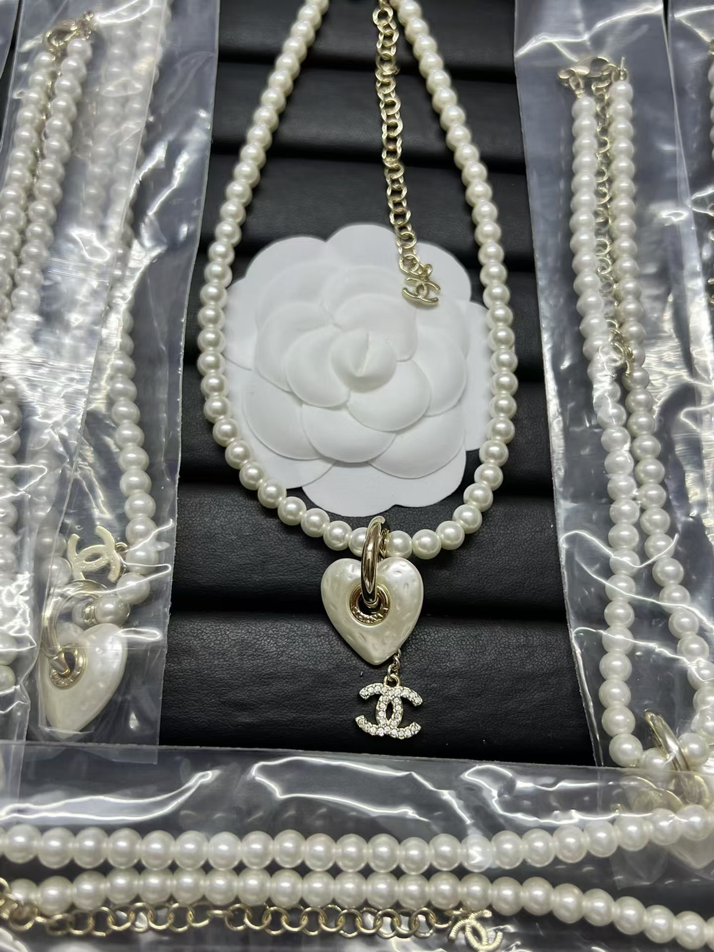 Buy replica Chanel Heart with Double C Pendant Drop Pearl Necklace and replica jewelry from PICKS Jewelry