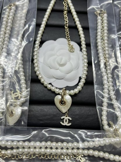 Buy replica Chanel Heart with Double C Pendant Drop Pearl Necklace and replica jewelry from PICKS Jewelry