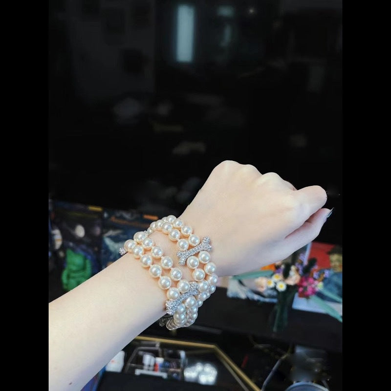 Buy replica Vivienne Westwood 2 Row Pearl Mixing Bone Bracelet and replica jewelry from PICKS Jewelry