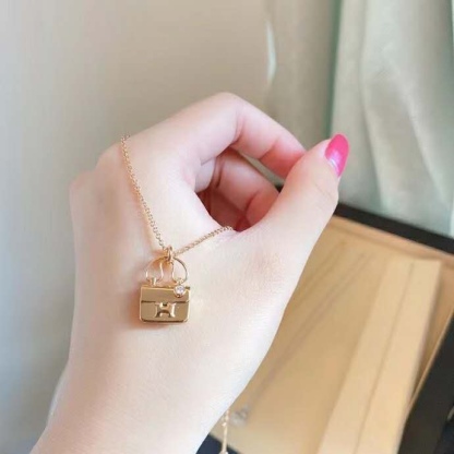 Buy replica Hermes Plain Surface Bag Pendant Necklace and replica jewelry from PICKS Jewelry
