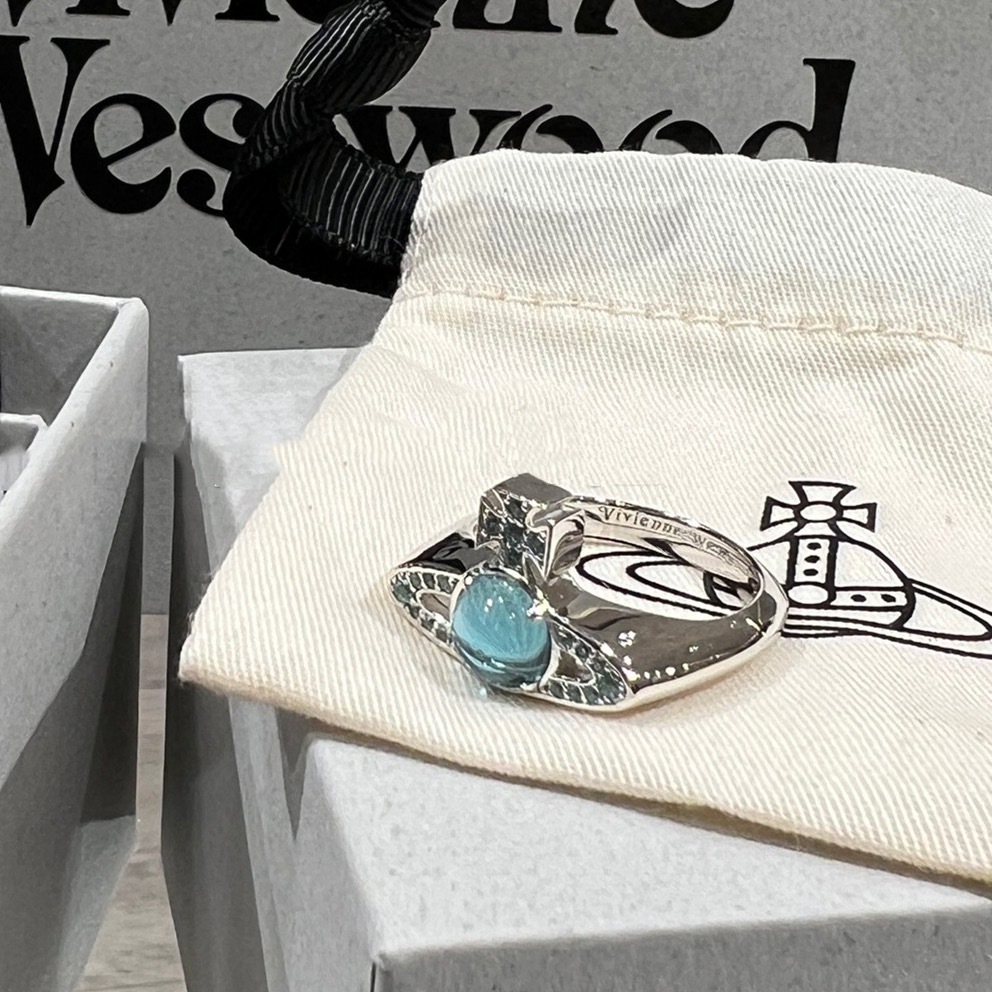 Buy replica Vivienne Westwood Lake Blue Lucky Bead Saturn Ring and replica jewelry from PICKS Jewelry