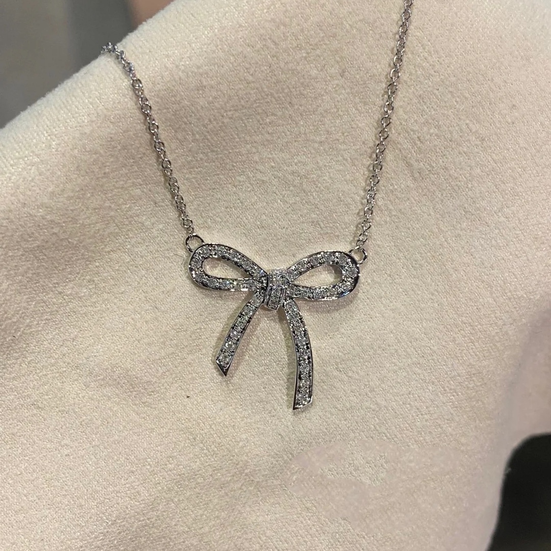 Buy replica Tiffany Large Full Diamond Bow Pendant Necklace and replica jewelry from PICKS Jewelry