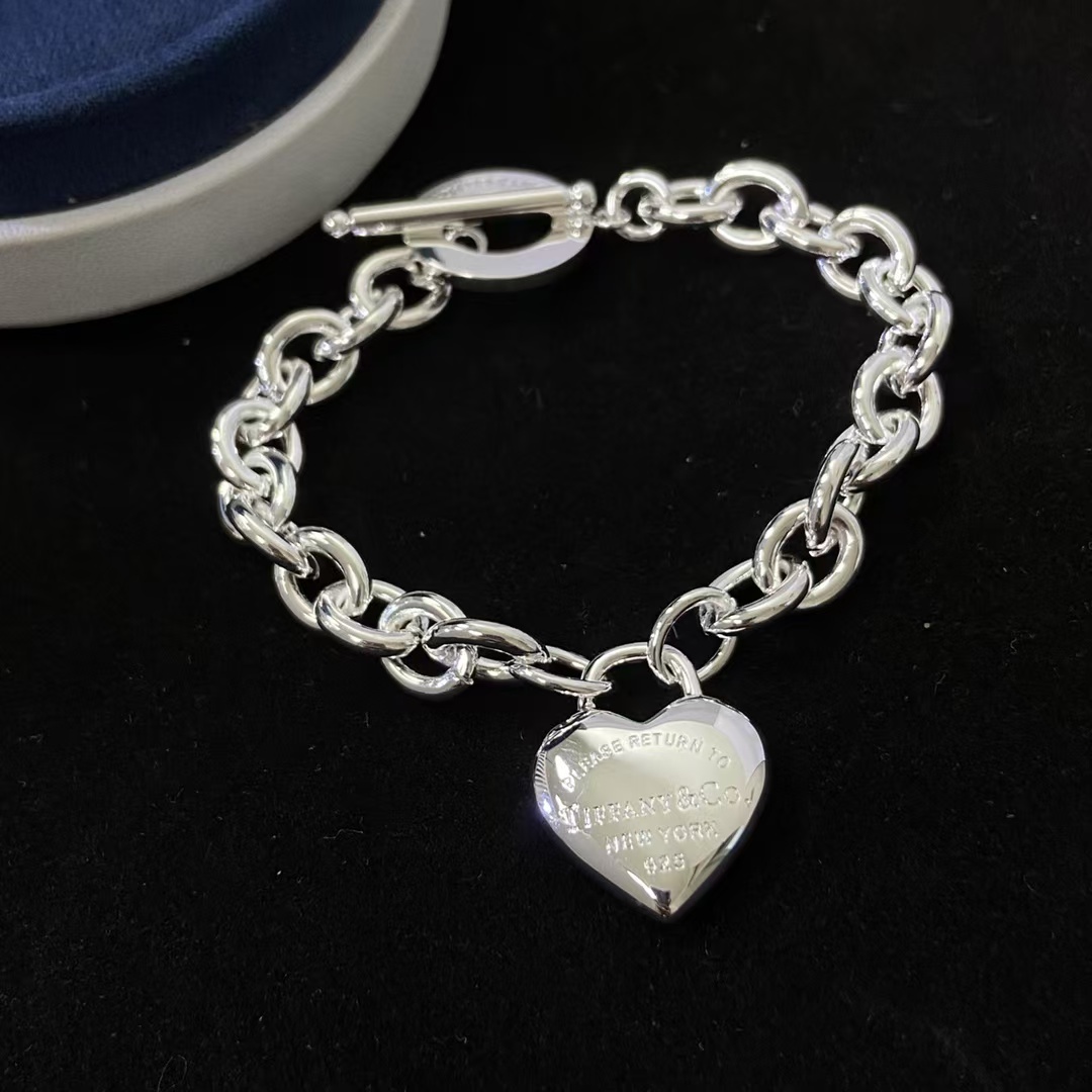 Buy replica Tiffany Heart Charm OT Clasp Bracelet and replica jewelry from PICKS Jewelry