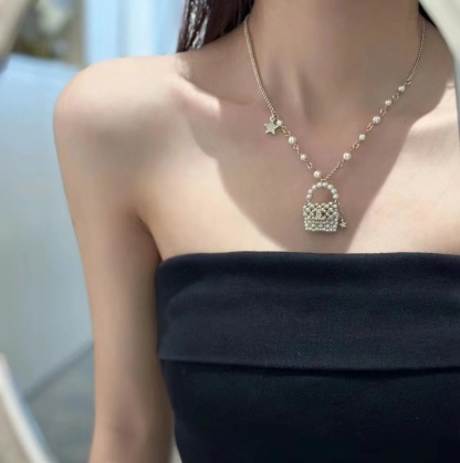 Buy replica Chanel Pearl Bag Pendant Necklace and replica jewelry from PICKS Jewelry