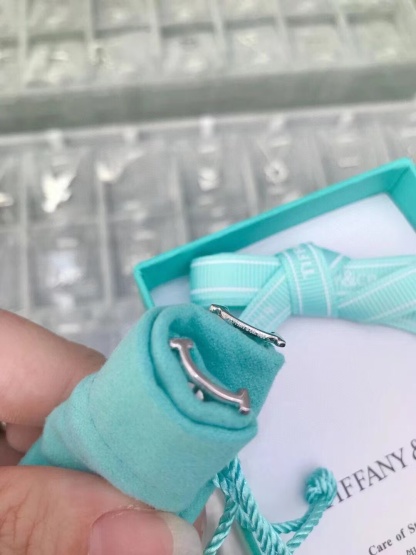 Buy replica Tiffany T Smile Earrings and replica jewelry from PICKS Jewelry