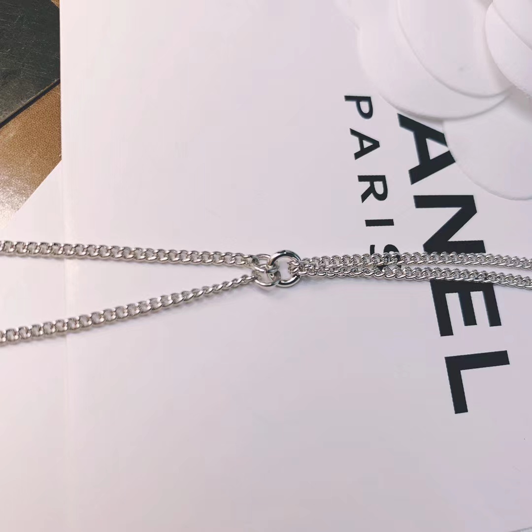 Buy replica Chanel Silver Color Tassel Pendant Necklace and replica jewelry from PICKS Jewelry