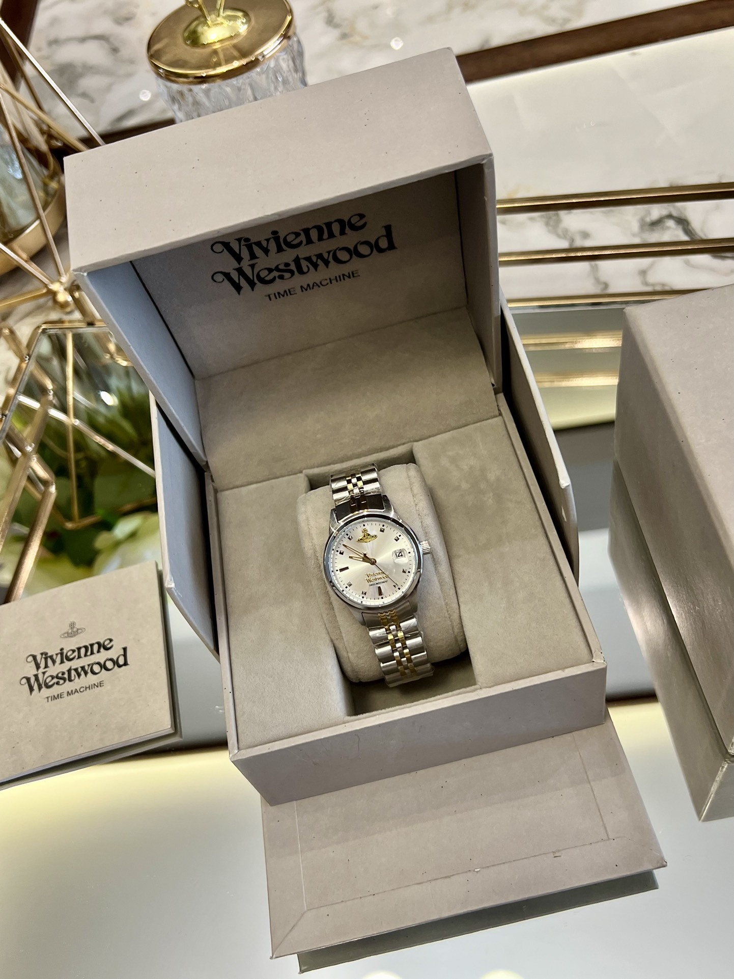 Buy replica Vivienne Westwood Silver Gold Mixed Color Band Watch - 30MM and replica jewelry from PICKS Jewelry