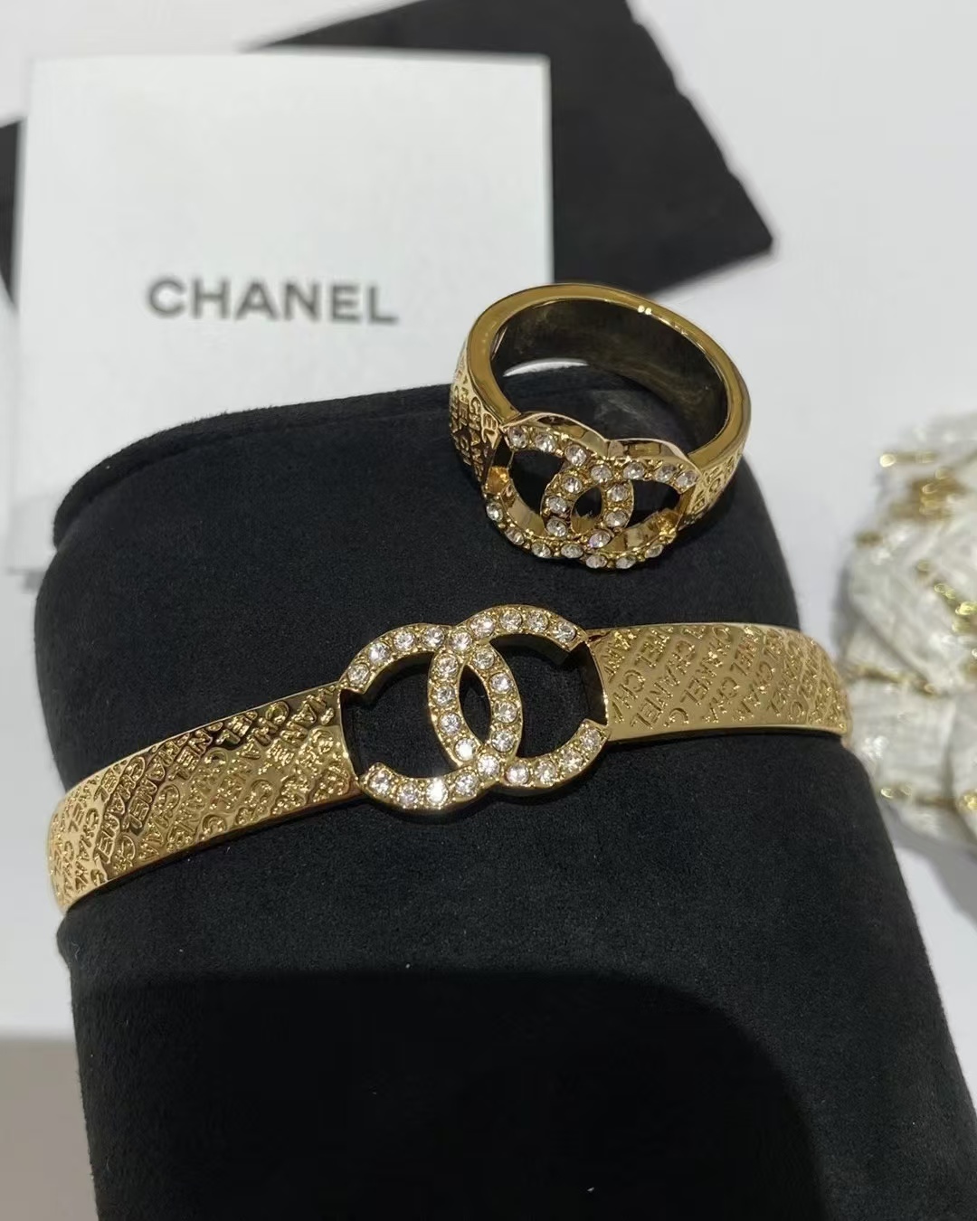 Buy replica Chanel Hollow Diamond Paved Double C Open Bangle Bracelet and replica jewelry from PICKS Jewelry